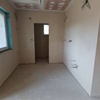 Eladó egy kiváló elhelyezkedésű, 88,75 m² hasznos alapterületű ikerházfél Bugyi központjához közel!